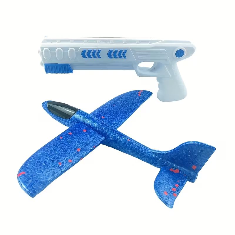 Avión de juguete blanco con lanzamiento de un botón